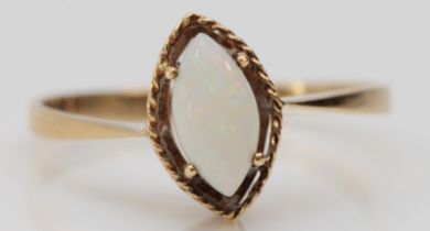 A 9ct gold mounted navette cabochon cut opal ring, M, 1.2gm