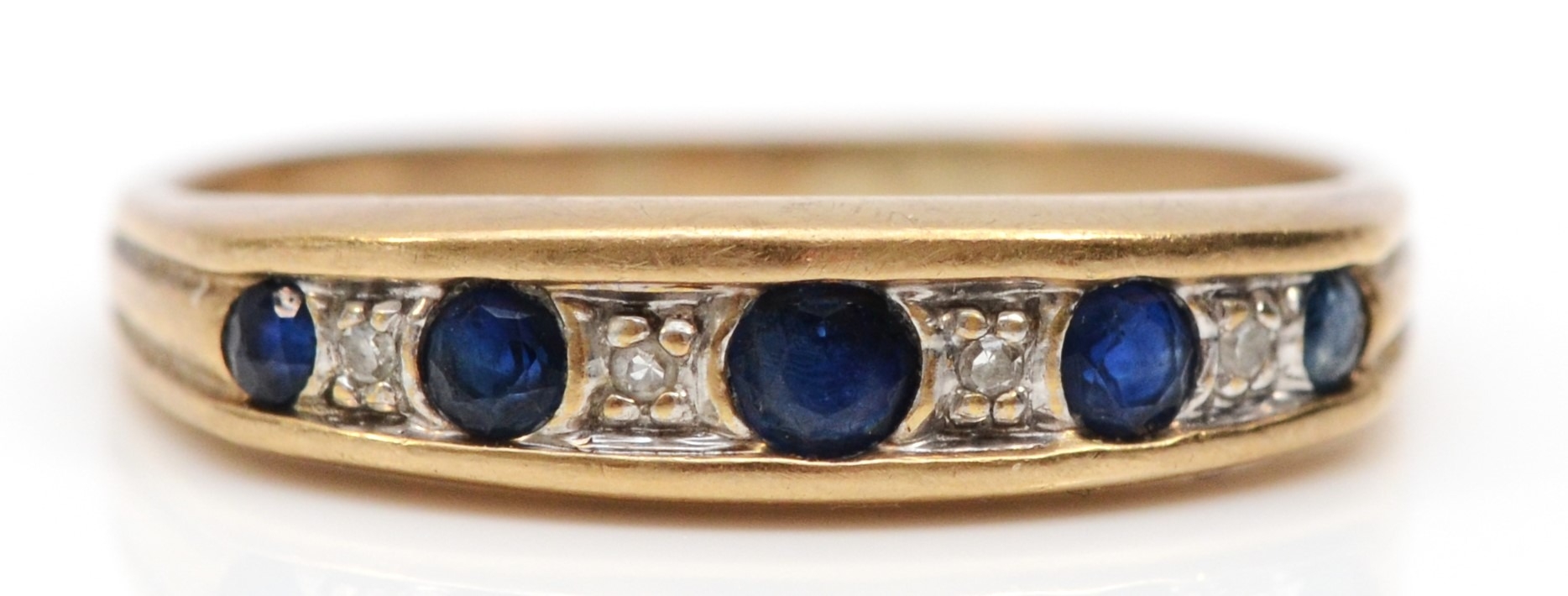 A 9ct gold sapphire and diamond half eternity ring, R, 2gm