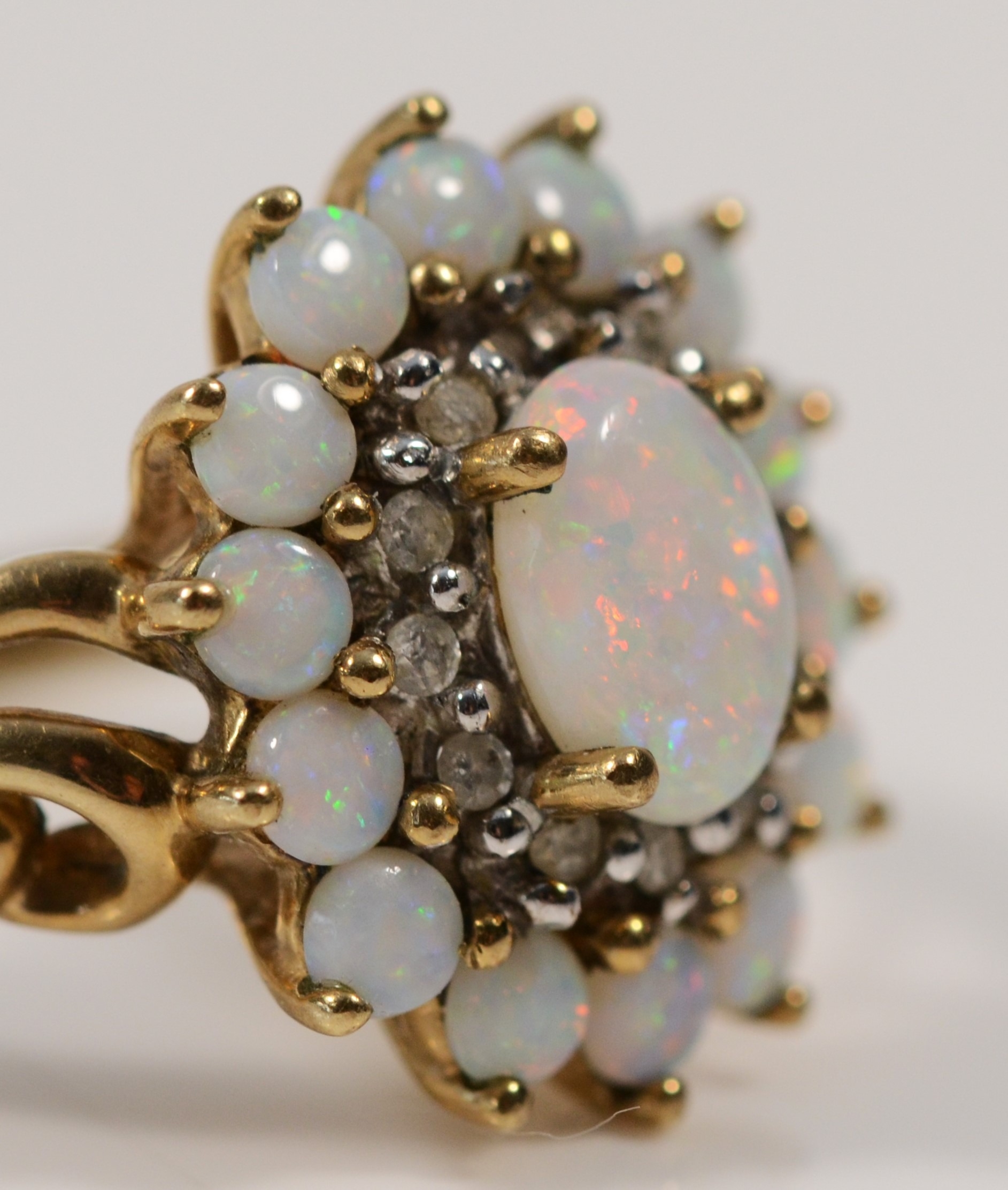 A 9ct gold opal and brilliant cut diamond cluster ring, one diamond vacant, 15 x 13mm, O, 3gm - Image 3 of 3