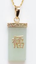 A Chinese 9k gold and jadeite pendant, 19mm, chain