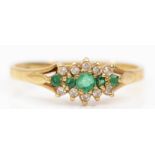 A 9ct gold emerald and diamond three row ring, L, 1.3gm