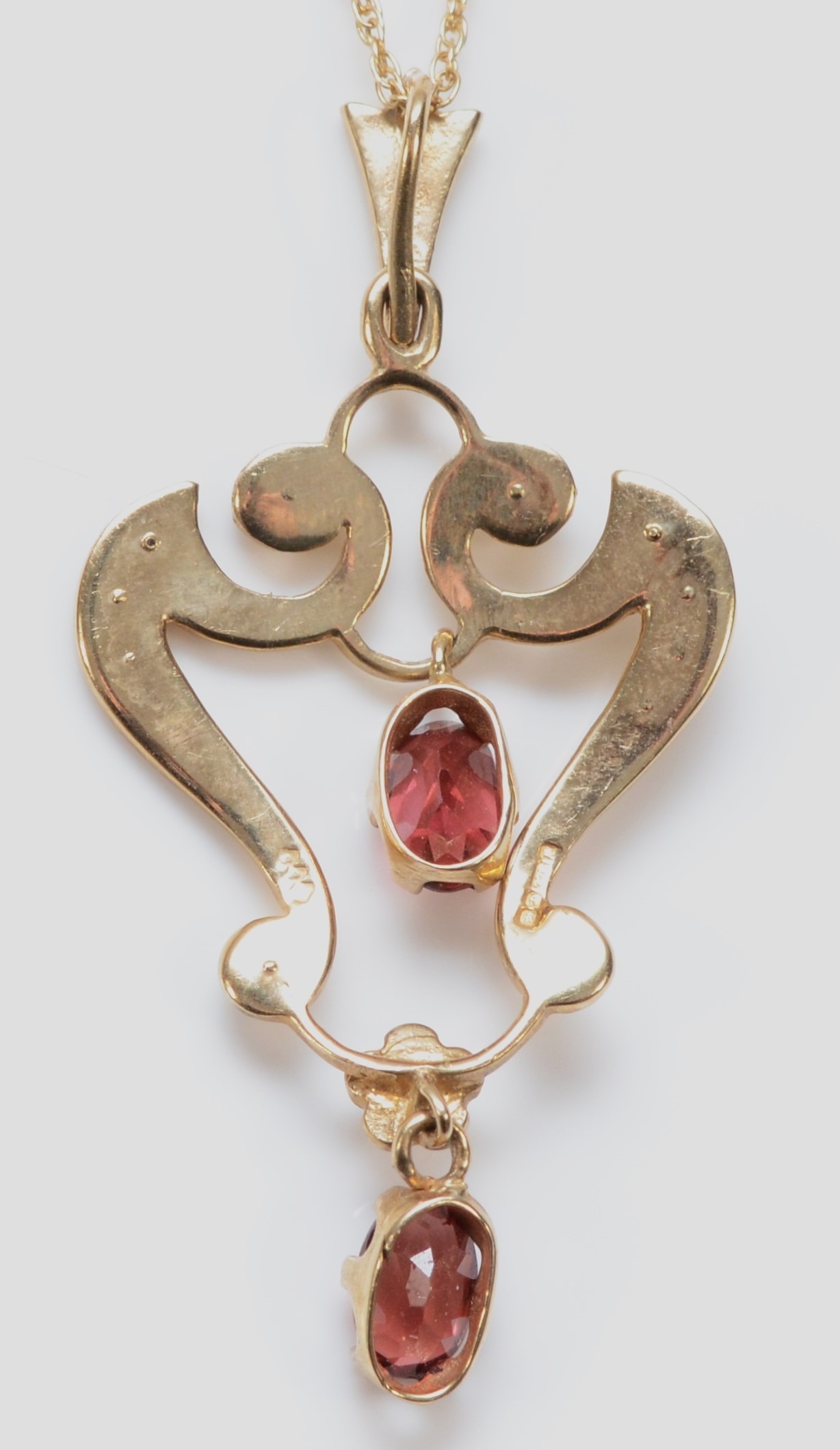 A Victorian style 9ct gold garnet and half pearl set openwork pendant, 40mm, chain, 3.4gm - Bild 2 aus 2