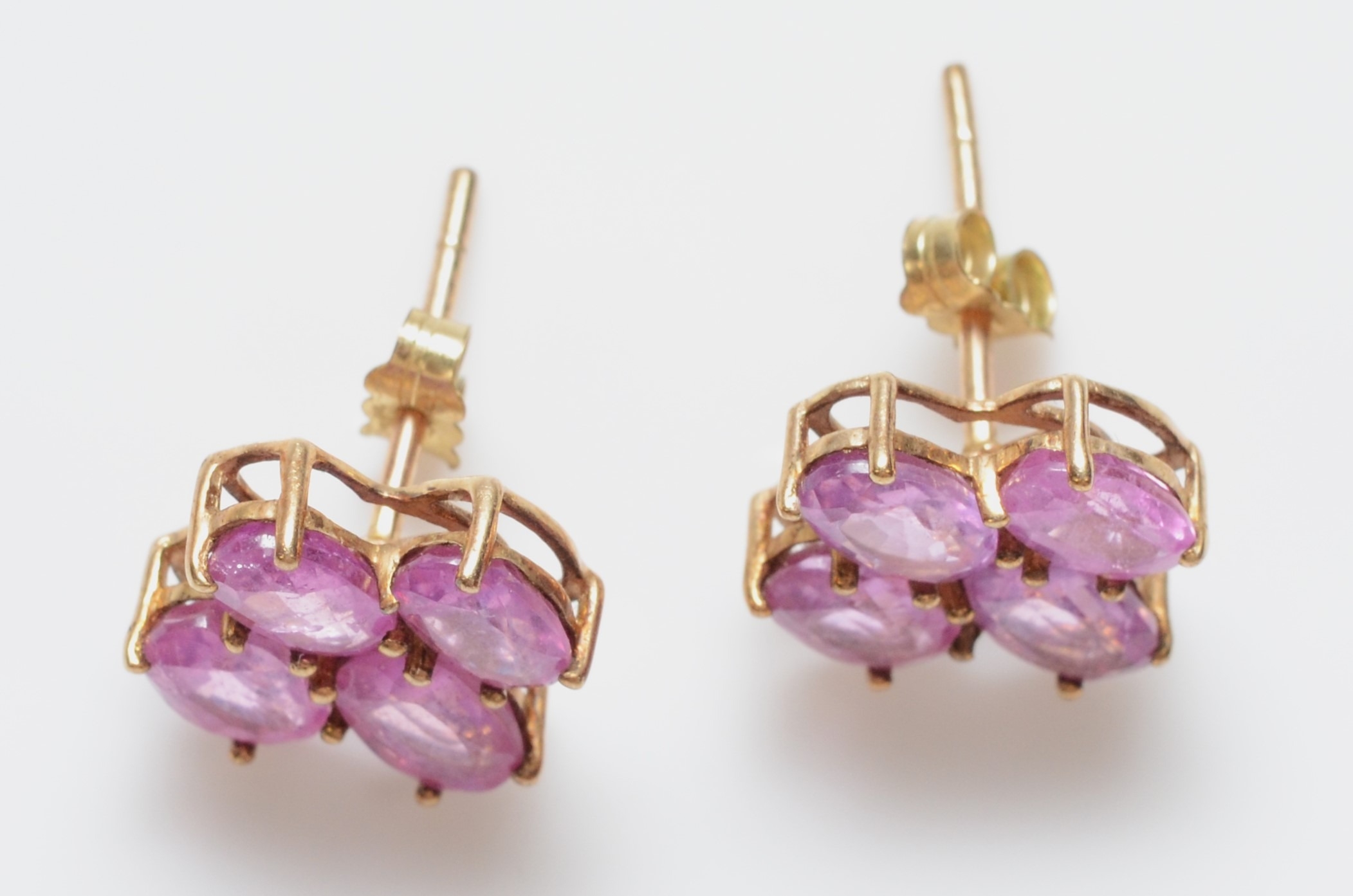 A 9ct gold pair of pink sapphire ear studs, 12 x 11mm, 2.2gm - Image 2 of 2