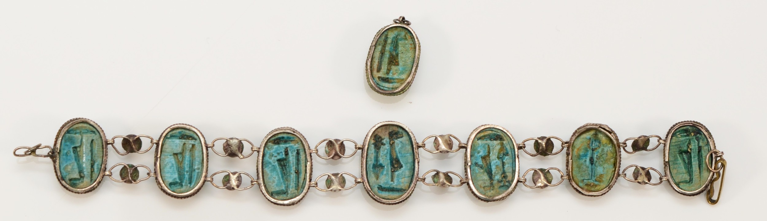 A low grade silver and faience scarab beetle bracelet, 17cm, together with a matching pendant. - Image 3 of 3