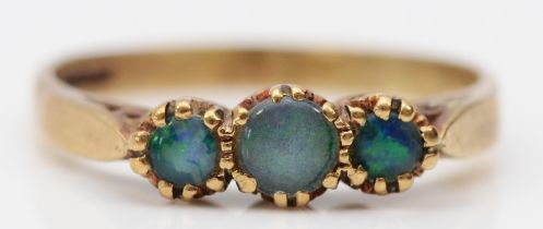 A 9ct gold and opal triplet three stone ring, N 1/2, 1.9gm