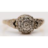 An 18ct gold diamond cluster ring, K, 2.9gm