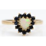 A 9ct gold opal and sapphire heart shape cluster ring, N 1/2, 2.2gm