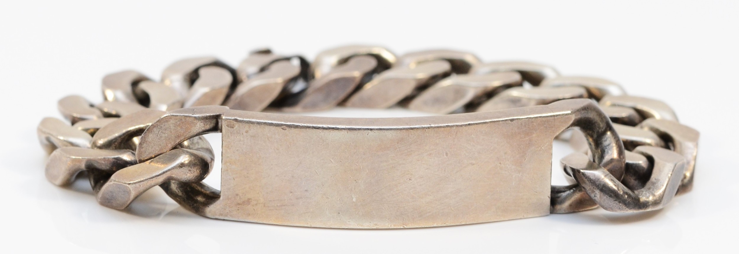 A heavy silver ID bracelet, Birmingham 1973, 143gm, 23.5cm