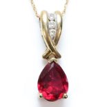 A 9ct gold red stone and brilliant cut diamond pendant, 21mm, chain, 2.1gm