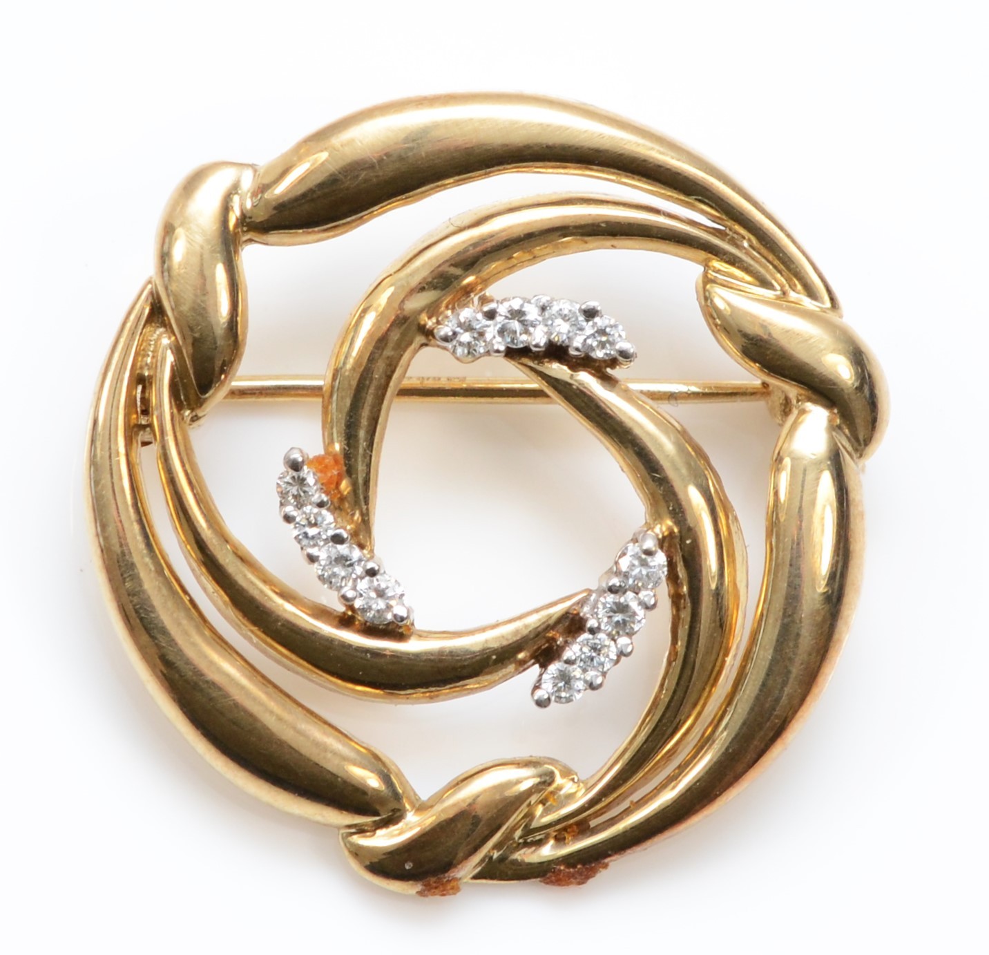 A 375 gold brilliant cut diamond brooch, 24mm, 3.5gm.