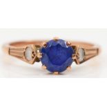 A 9ct rose gold blue and white stone ring, O, 2.4gm