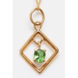 A 9ct gold and green stone pendant, 18mm, chain, 2gm
