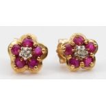 A pair of 9ct gold ruby and diamond ear studs, 1.2gm