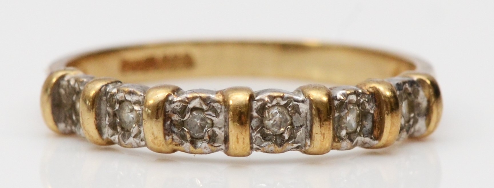 A 9ct gold and diamond ring, L, 1.4gm