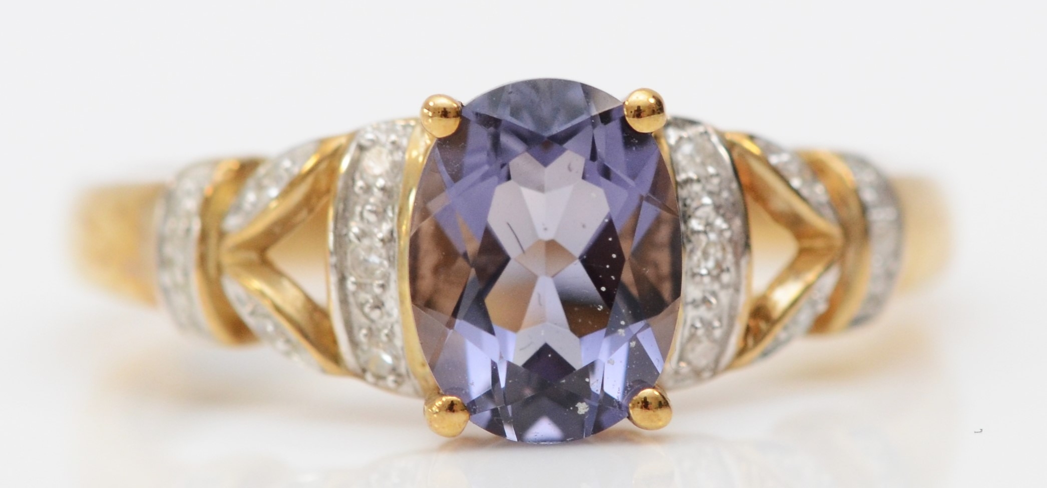 A 9ct gold iolite and diamond dress ring, O, 2.7gm