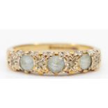 A 9ct gold blue stone and diamond ring, M, 2.2gm
