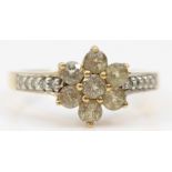 A 9ct gold yellow gemstone and diamond cluster ring, O, 2.4gm