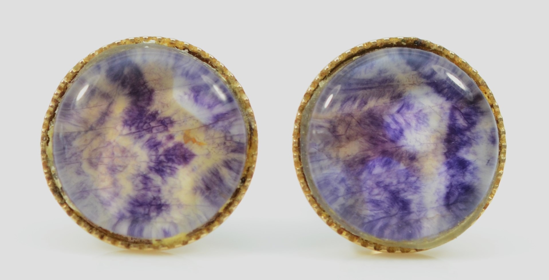 A pair of 9ct gold mounted Blue John ear studs, diameter 8mm