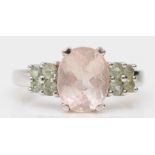 A 9ct white gold morganite and pale green gemstone dress ring, O, 3.7gm