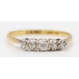 An 18ct gold alternate old cut diamond (2) and paste (3) three stone ring, O, 2gm