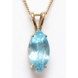 A 9ct gold and topaz pendant, stone 14 x 7mm, chain, 3gm