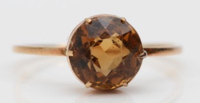 A 9ct gold and citrine single stone ring, R 1/2, 2gm