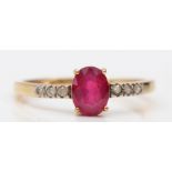 A 9ct gold, red gemstone and diamond ring, N, 1.3gm