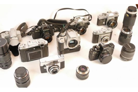 A collection of mixed cameras and accessories to include six lenses, three digital cameras and - Image 2 of 3