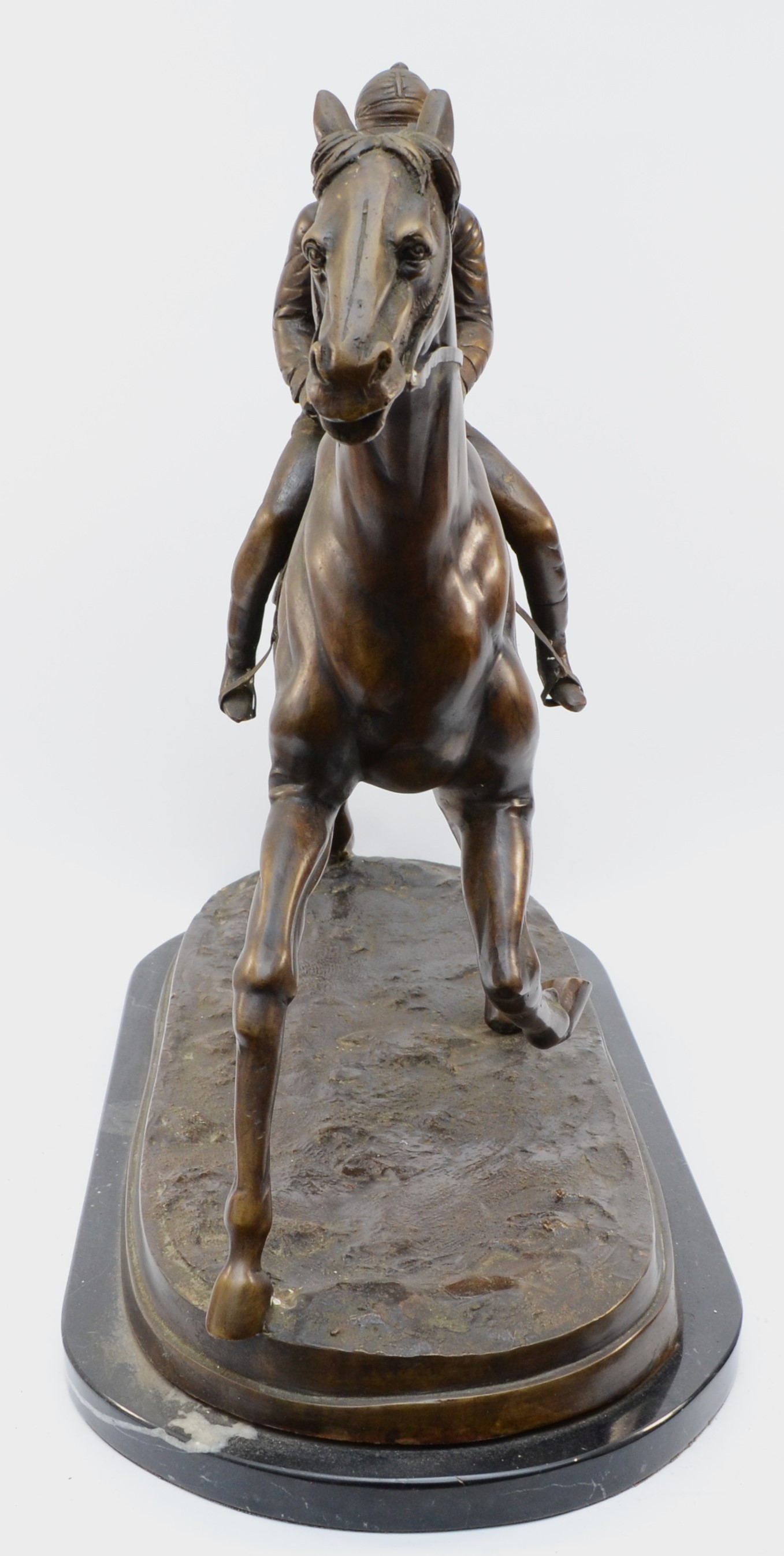 After Mene, a bronze of a racehorse and jockey, on a naturalist base, raised on a marble base, - Image 3 of 4