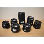 Seven Various lenses. An Exakta MC Macra 1:4,5-5,6 70-210mm, A Mamiya Sekor SX !:1,8 55mm, a Minolta