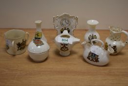A group of assorted crested ware, to include a Blackpool Progress clock ornament, a Sheffield double
