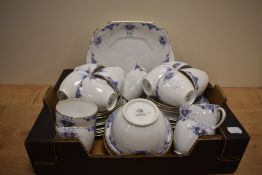 A very pretty Wellington China part tea service having gilt edges and oriental inspired decoration
