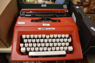 A vintage Olivetti Collage typewriter in soft carrycase.