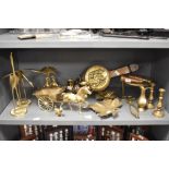 An assortment of brass studies, pin dishes, trivet, bellows to be included.