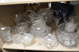 A collection of glassware, including cut glass fruit bowl, basket and vases, pressed glass jug and