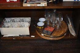 A Mid century circular brass mounted two-handled and galleried rattan drinks tray in the style of Ga