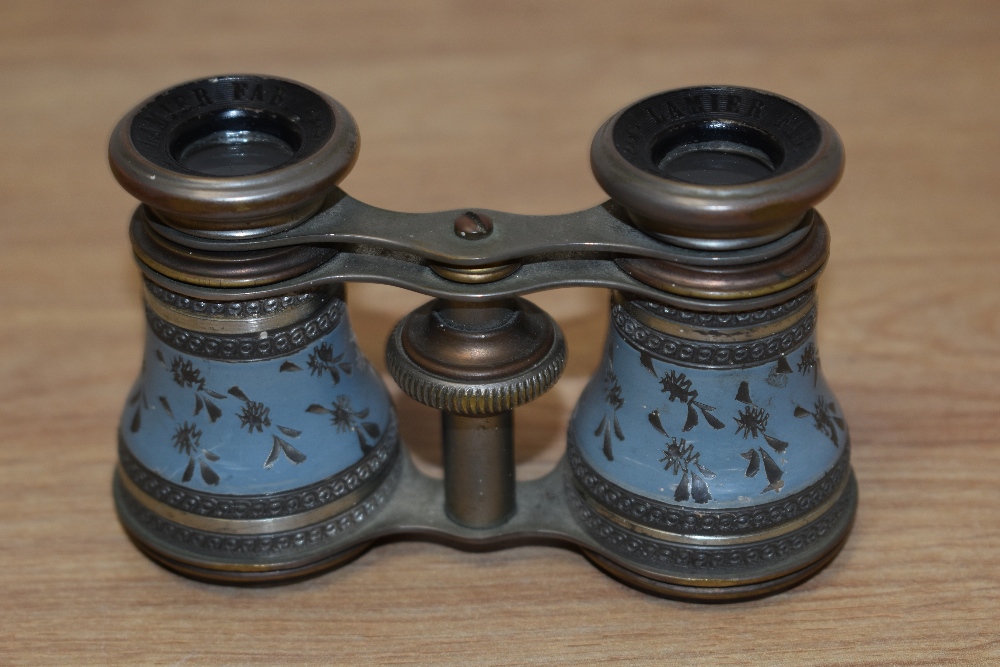 A pair of Lamier Fab Paris opera glasses, having etched decoration to blue barrels.