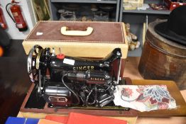 A Singer sewing machine, model number K8778454, with case.