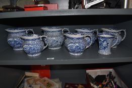 A collection of 19th Century William Adams blue and white 'Cobble Stone' custard jugs, of graduating