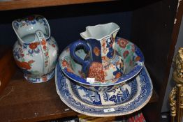 A reproduction Victorian Masons Ironstone style toilet jug and bowl, of octagonal shape and in Imari