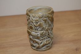 An continental stoneware tumbler, having hunting scene to outside, depicting boar, horse, huntsmen