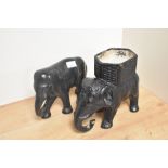 Two early 20th Century chalkware elephant ornaments, the largest measuring 18cm tall