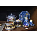 An assorted collection of Grimwades Byzanta lustre ware, a Maling style flower basket on blue