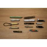 A selection of vintage pen knives, including Mother of Pearl, patterned examples, one with gold tone