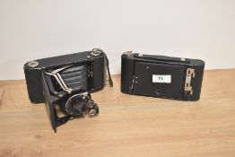 Two early 20th Century folding cameras, comprising a Kodak Autographic Brownie No.2 camera & an