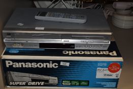 A JVC HR-XV31 DVD and video player plus a boxed Panasonic Super Drive video cassette recorder
