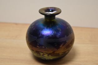 A Mdina spherical iridescent vase having petrol toned mottled decoration, with short neck and