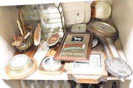 A selection of items, including barometers, model boats and a White Horse Whiskey adverting mirror.