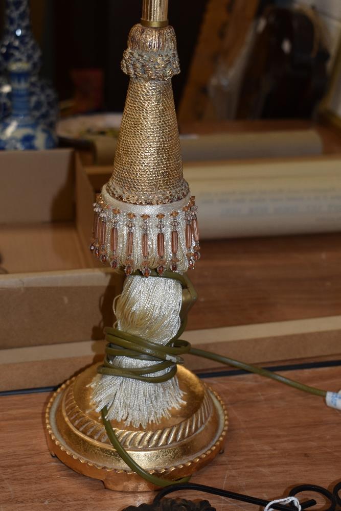 A pair of Continental style gilt table lamps with embroidered embellishments and tasselled shades, - Image 2 of 2