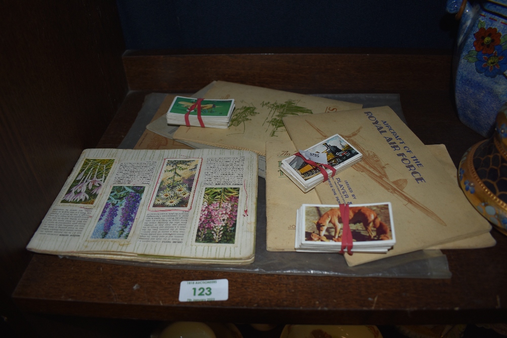 A small collection of cigarette cards relating to botany, birds and their young, and the RAF